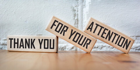 Wooden cubes with the words Thank you for your attention. Beautiful background. - obrazy, fototapety, plakaty