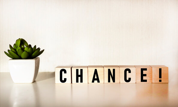Wooden cubes with inscriptions Chance. Changes and new chances in a person's life