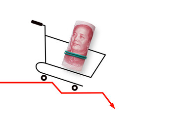 Shopping basket with yuan money on red arrow. Economic crisis, inflation and commodity prices...