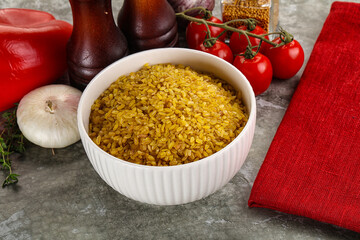 Dry wheat bulgur cereal heap