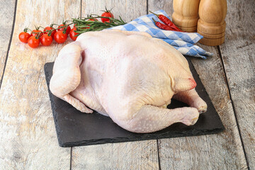 Whole raw chicken for cooking
