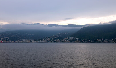 while you are arriving at the port of Bastia in Corsica during sunrise