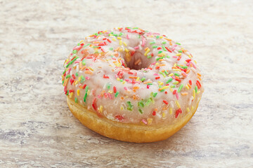 Sweet glazed vanilla donut with icing
