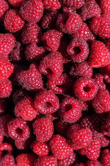 bright juicy red raspberry background texture