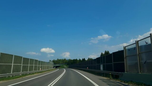 Protective screens along the freeway. animal crossing bridge..view of the Beskydy mountains. Poland