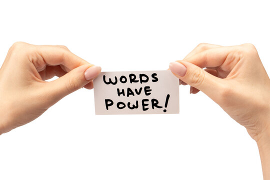 Words have power text on a card in a woman hand isolated.