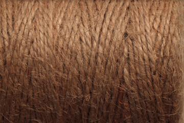 Brown coil of rope background.