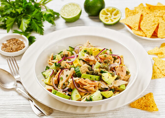 tuna salad with avocado, onion, cucumber, capers