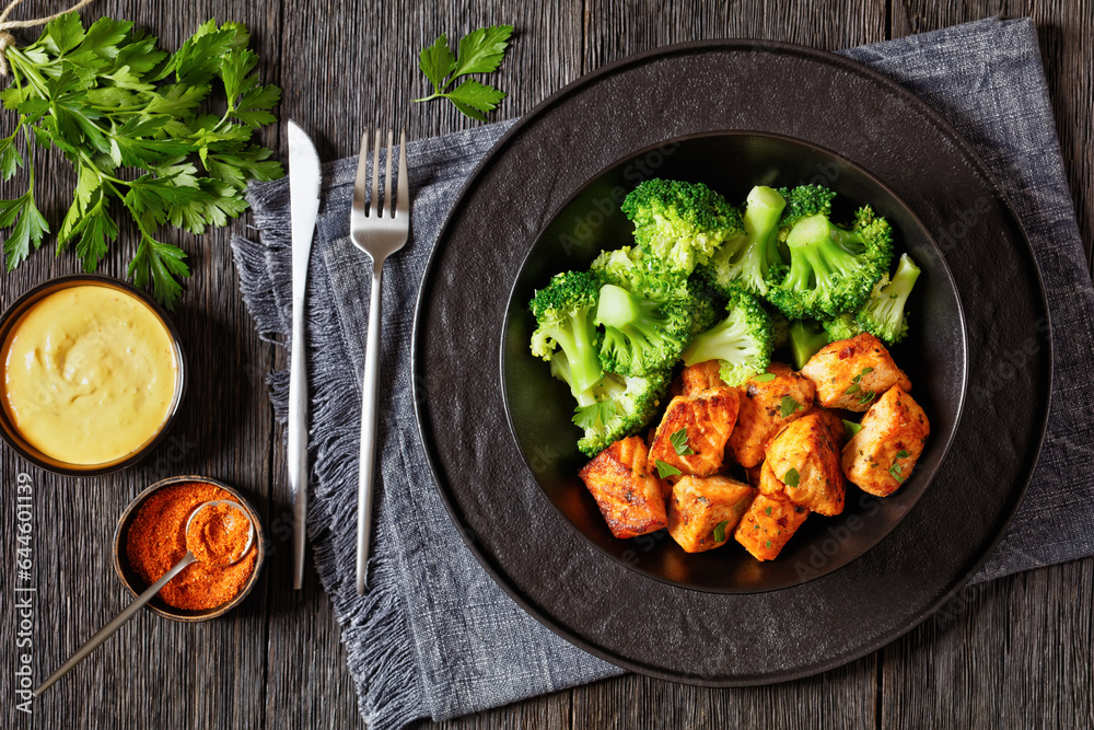 Sticker baked salmon bites with steamed broccoli florets