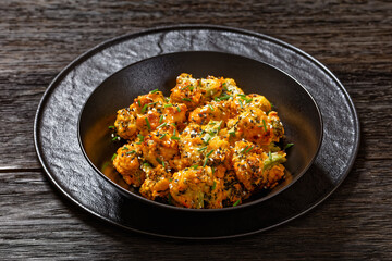 bang bang broccoli bites in bowl, top view