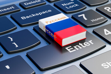 Russian language textbook on laptop keyboard. Online courses of Russian language, 3D rendering © natatravel