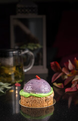 Modern confectionery art. Dessert. Cake. Black backround