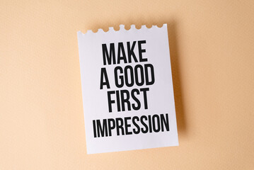 Make a Good First Impression text on white sticky note on yellow background.
