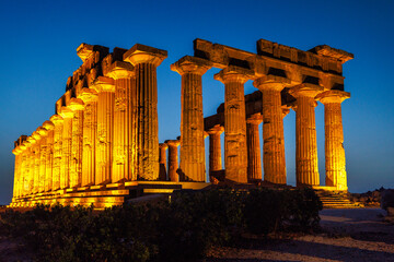 Temple of Hera in Selinunte under artificial lighting at evening. The archaeological site at Sicily, Italy, Europe.