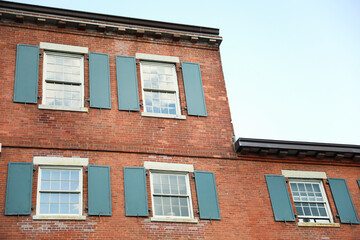 brick building in the urban skyline symbolizes real estate's enduring strength, growth, and mortgage