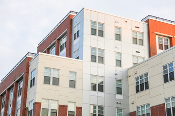 modern building, a symbol of urban growth and real estate prosperity, blends metal and stone to shape our skyline and secure mortgages for future dreams