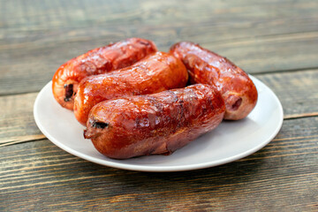 Fire-roasted sausages close up