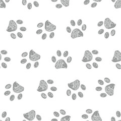 Grey doodle paw prints pattern. Seamless fabric design pattern