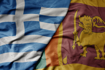 big waving national colorful flag of greece and national flag of sri lanka .