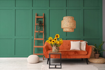 Vase with beautiful sunflowers on table in interior of living room