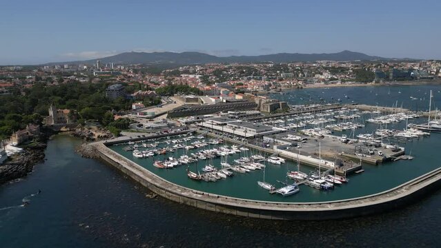 Aerial panoramic view of Cascais coastline and the Cascais Marina during summer, Lisbon District, Portugal. 