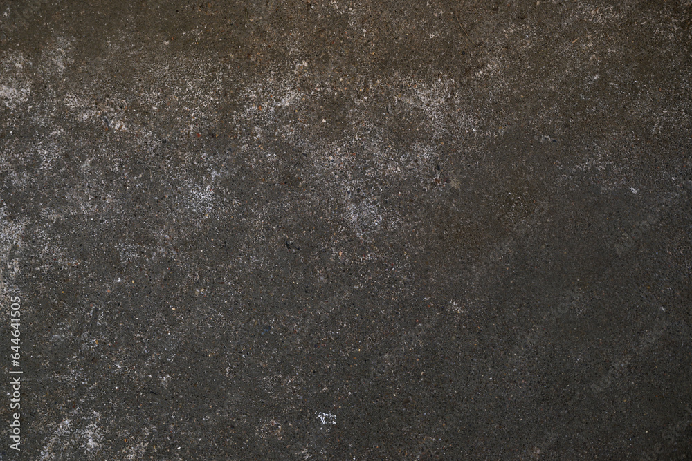 Wall mural dark gray concrete surface as grunge background texture for urban themes like subculture, undergroun