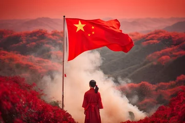 Foto op Plexiglas Back view of a Chinese woman with a Chinese flag on the mountain.  © Alan