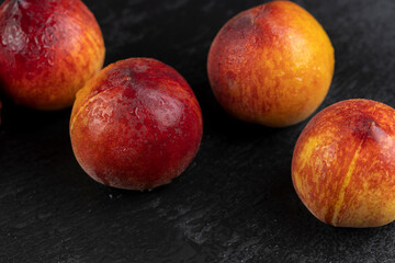 ripe delicious and fresh peaches of a red hue