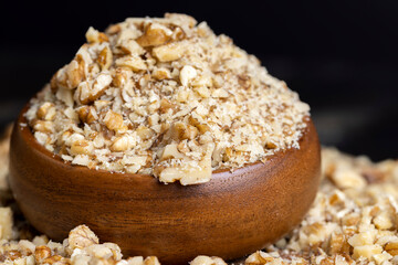 Crushed dried walnuts on the table