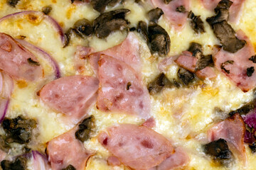 close-up of fresh and hot pizza using many ingredients