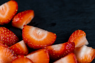 pieces of ripe strawberries of red color
