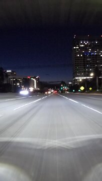 Los Angeles night freeway driving time lapse on routes 5 and 134 in the San Fernando Valley.  Vertical View