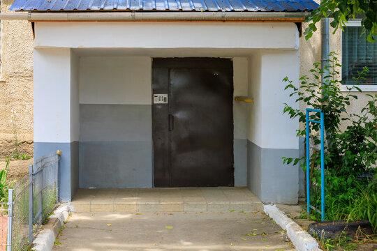 Doors of the entrance or front door of a residential multi-storey building. Background with selective focus