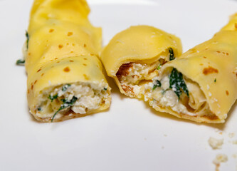 Traditional ricotta pancakes with spinach and cheese