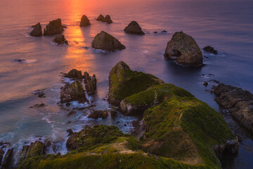 Sunrise over the sea with rocks 