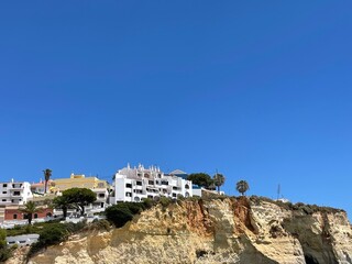 Fototapeta premium View of Carvoeiro fishing village with beautiful beach, Algarve