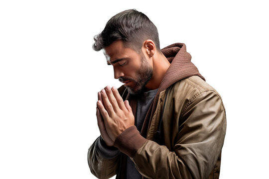 Young Latin American man praying isolated on white background