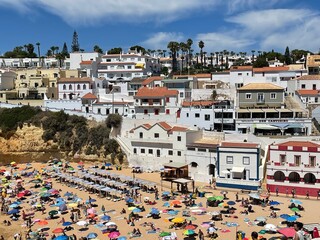 Obraz premium View of Carvoeiro fishing village with beautiful beach, Algarve