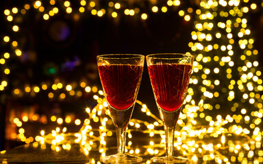 christmas background with glasses and christmas lights