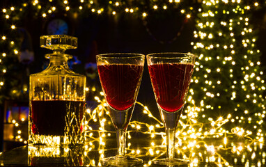 christmas background with glasses and christmas lights
