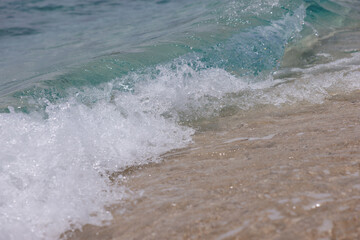 wave rolling across the beach, fiji