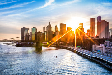 Brooklyn Bridge and the Lower Manhattan skyline at sunset, as viewed from Manhattan Bridge