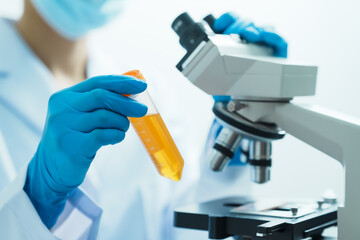 Close-up of laboratory technician conducting rigorous oil test, ensuring product integrity and safety, oil sample for quality control and purity testing, advancing petrochemical knowledge