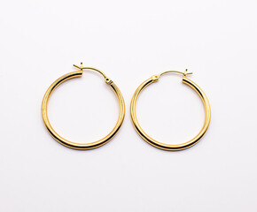 Two Hoop Earrings on a white background 