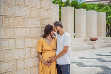 A loving couple in their 40s cherishing the miracle of childbirth in Mexico, embracing the journey...