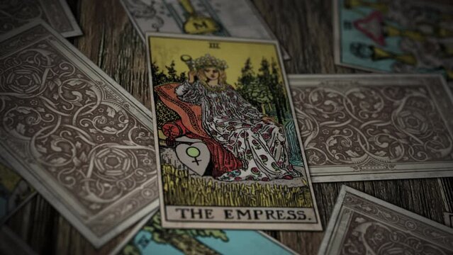 Milan, Italy - June 21, 2002. Ancient Supernatural Spell Calls The Empress Tarot Card As Symbol Of Beauty. Casting Ancient Supernatural Spell With Tarot Deck. Art Of Ancient Supernatural Spell Cards