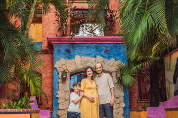 A loving couple in their 40s and their teenage son cherishing the miracle of childbirth in Mexico, embracing the journey of parenthood with joy and anticipation