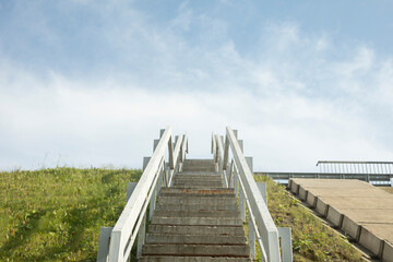 Obraz premium Stairs up. Climbing motorway. Technical structure.