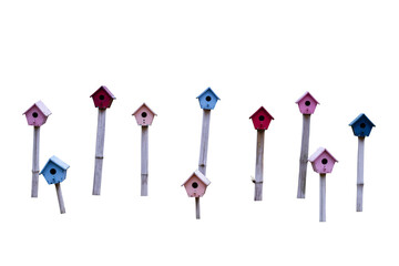 Colorful wooden bird house isolated on white background included clipping path.