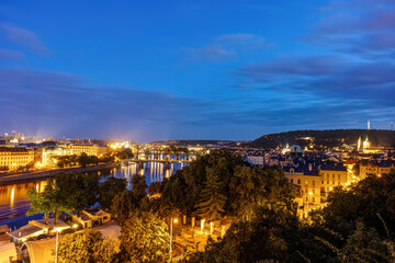 Fototapeta na wymiar View over Prague at night with the Mala Strana district at the right